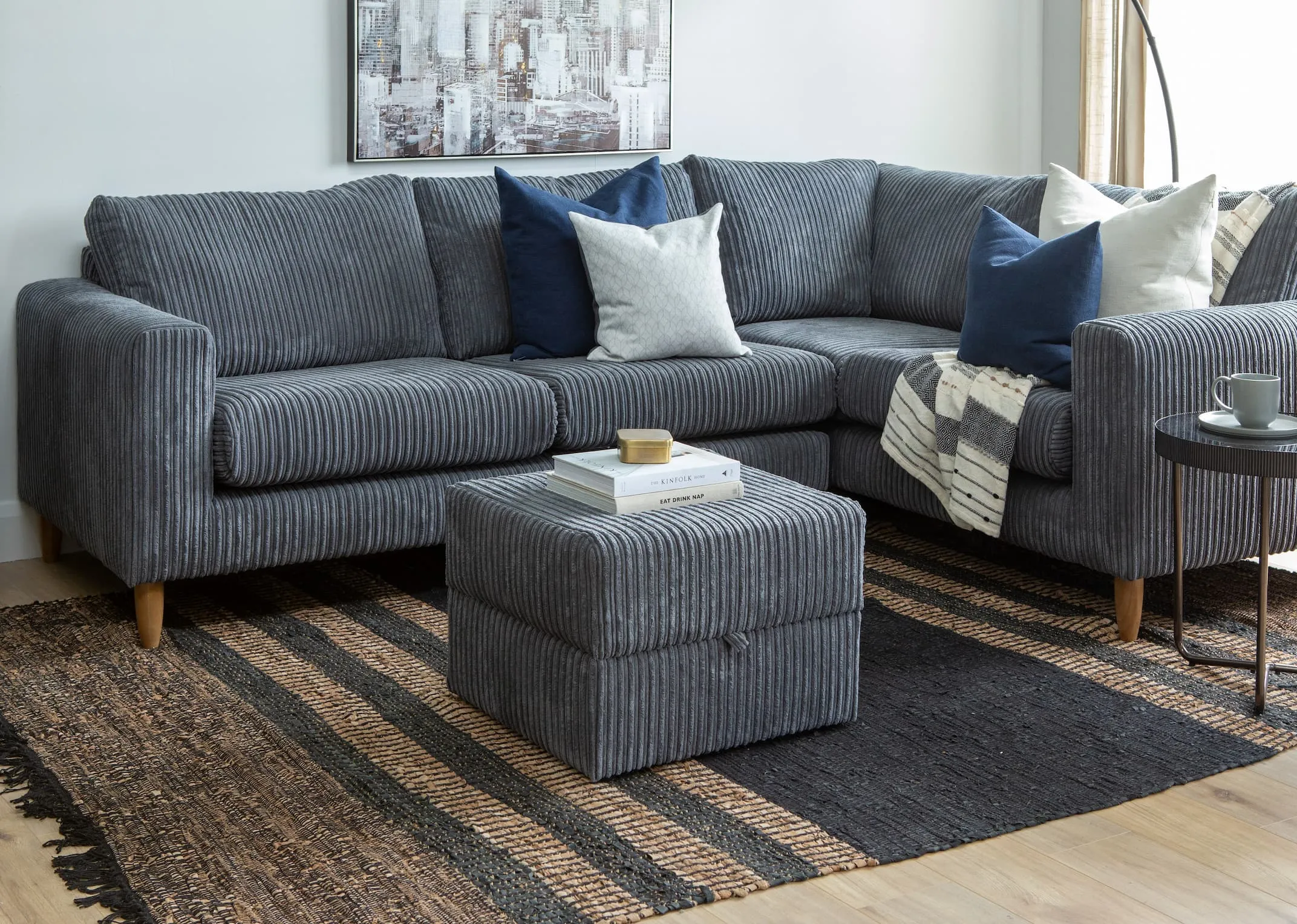 A lifestyle image of the Comfy Corner Sofa with shard tables and vagium rug.