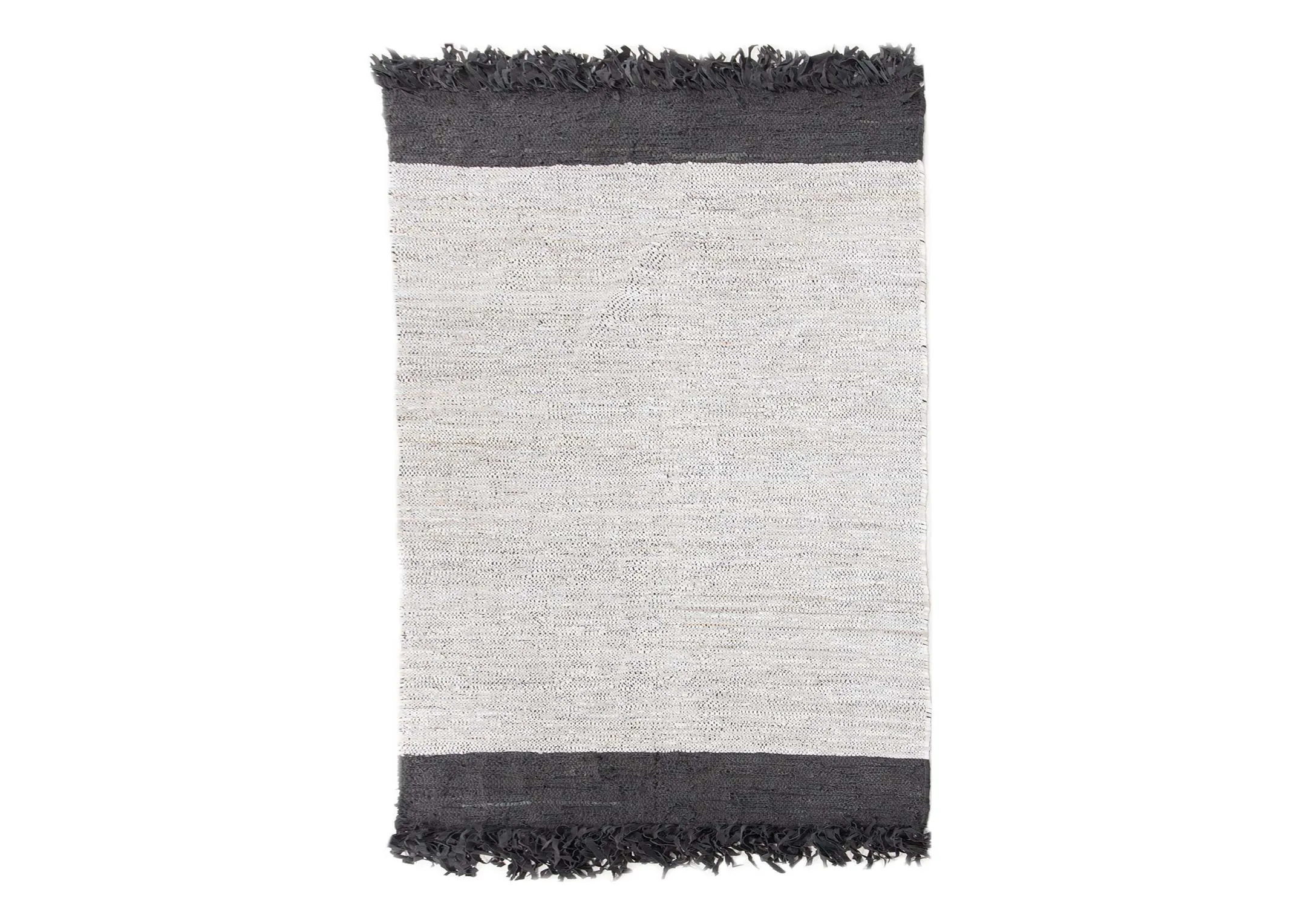 A grey & black stripped medium rug with fringe from EZ Livings Vagium range. Front view of vertical rug.