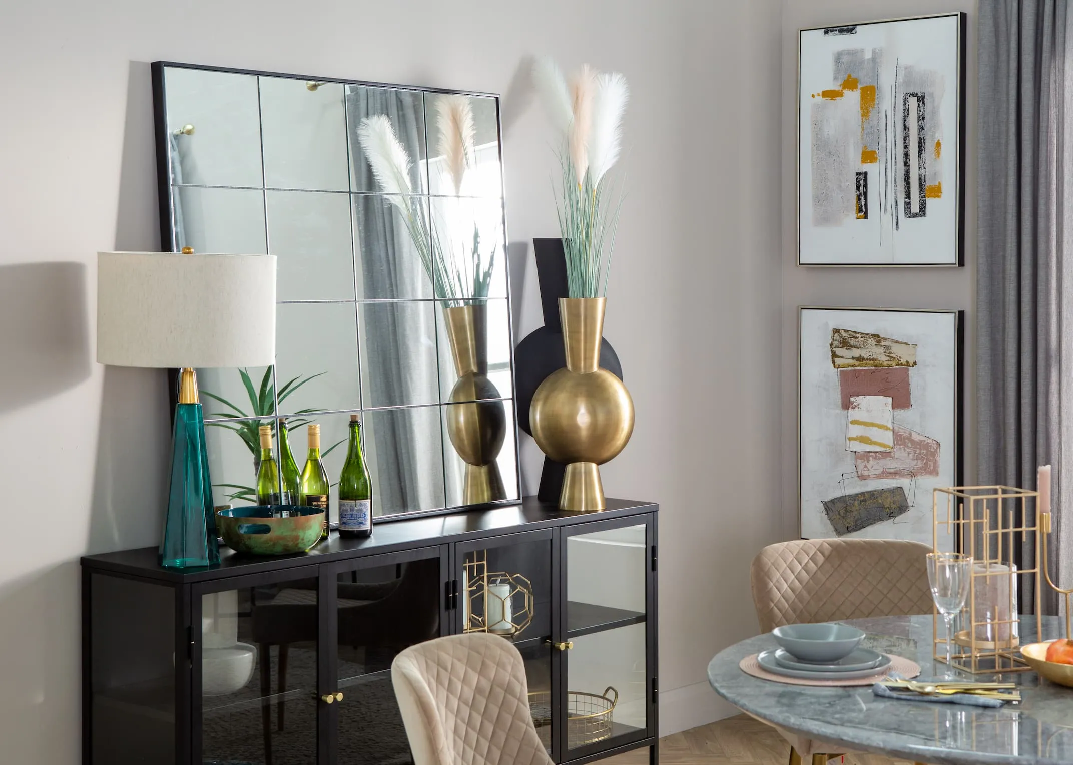 A lifestyle image of the Farley mirror with the Carmel sideboard.