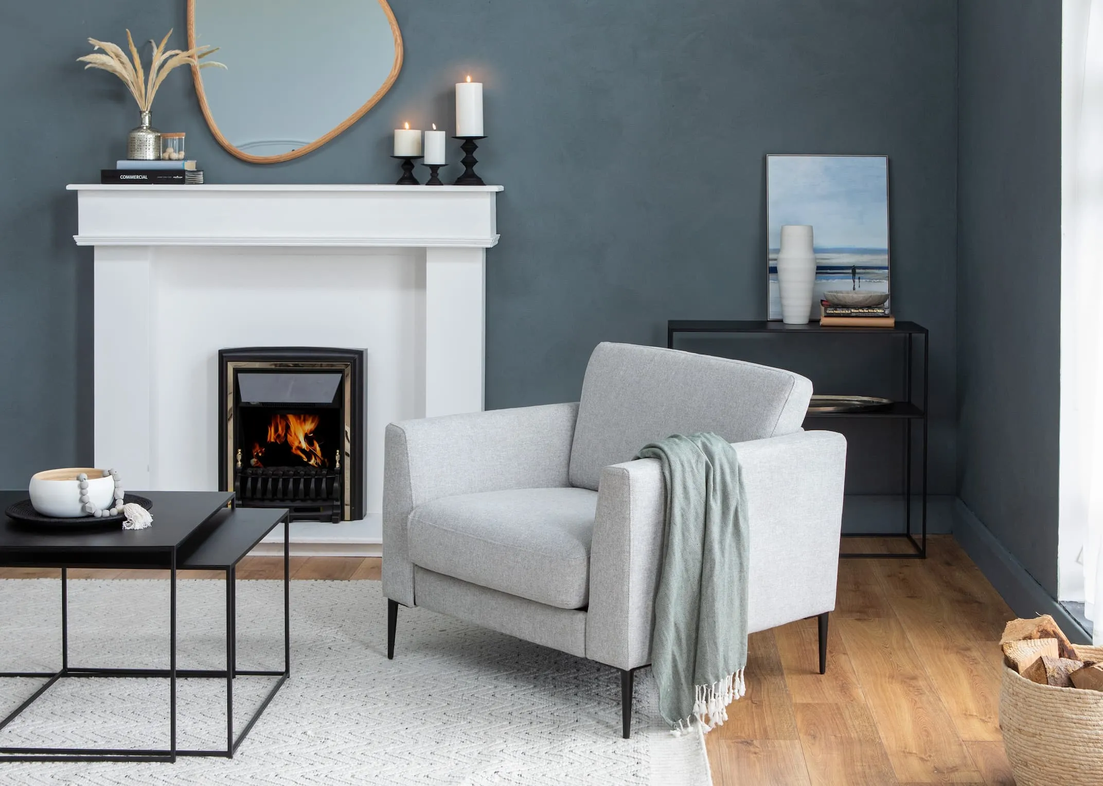 A lifestyle image of the Sofa in a Box with pebble tables & cody mirror with Shoreline print