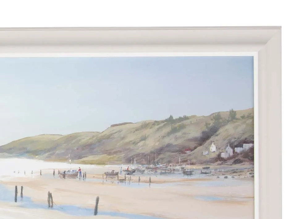 A framed Anthony Waller print of a rugged coastal beach from EZ Living's Calm Waters. Closeup of cream/grey frame