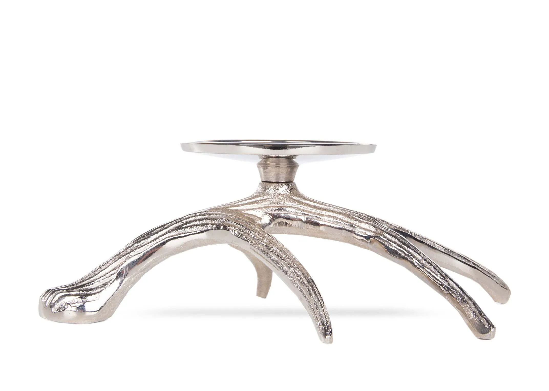 A Silver Branch Base with Pillar candle holder from EZ Living's Christmas range. Closeup view of engraved detail
