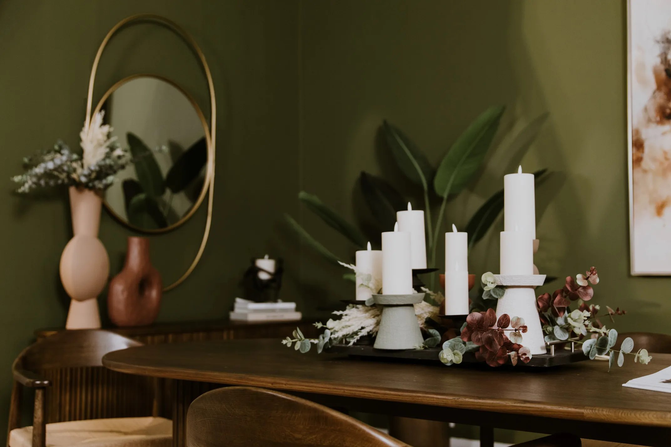A lifestyle image of the LED Candles in holders on the Retro table.