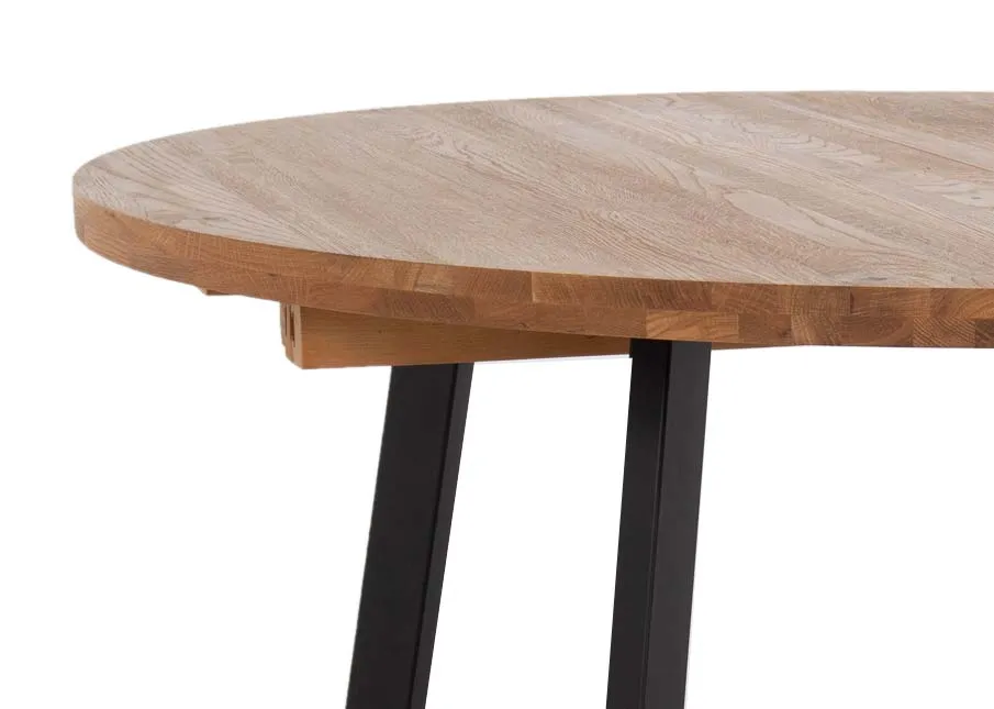 An oak round to oval extendable dining table from EZ Livings Renvyle range. Front view of table fully extended