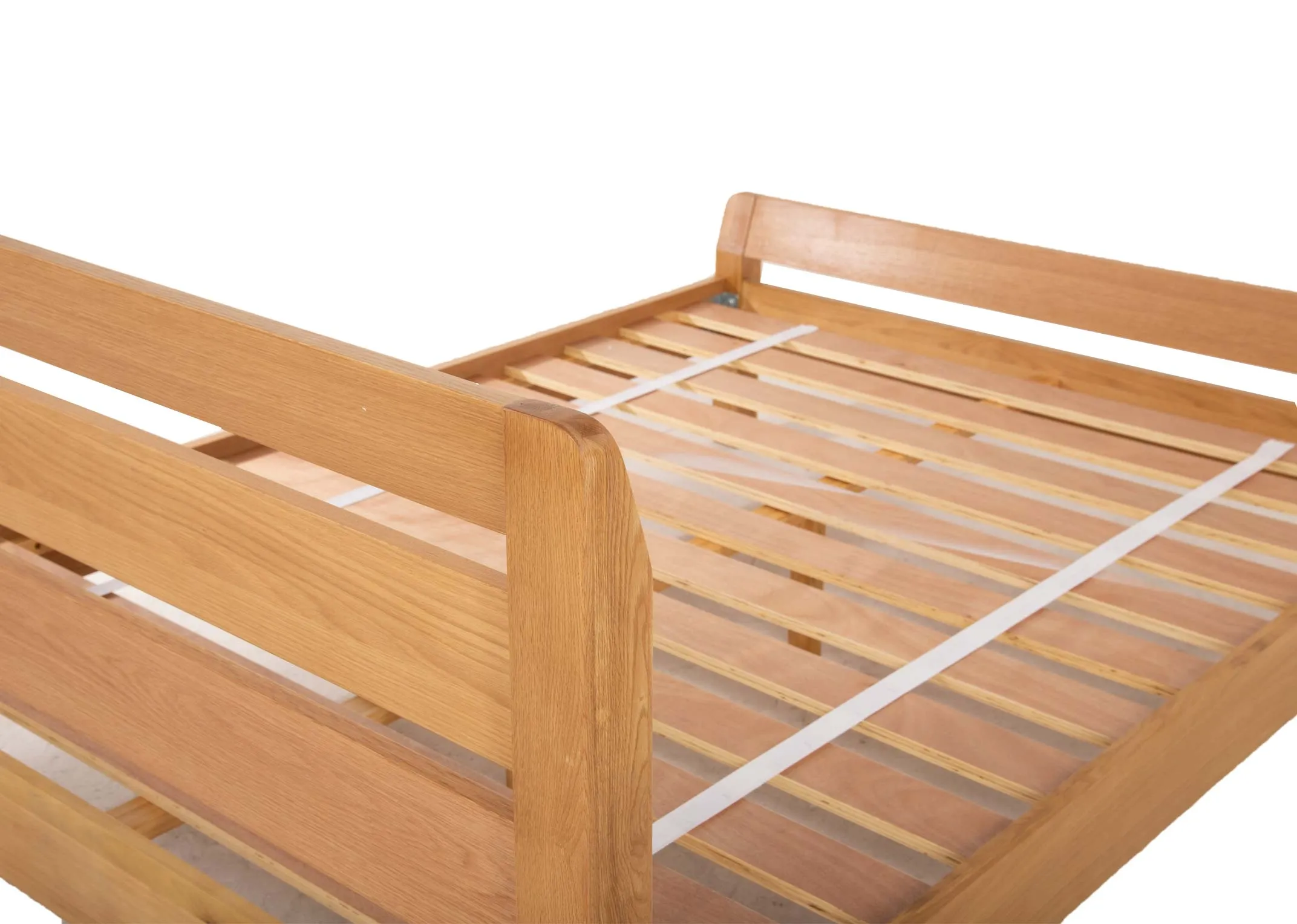 A 5ft king size oak bed frame from EZ Livings Iris range. Angled closeup of slatted bed base