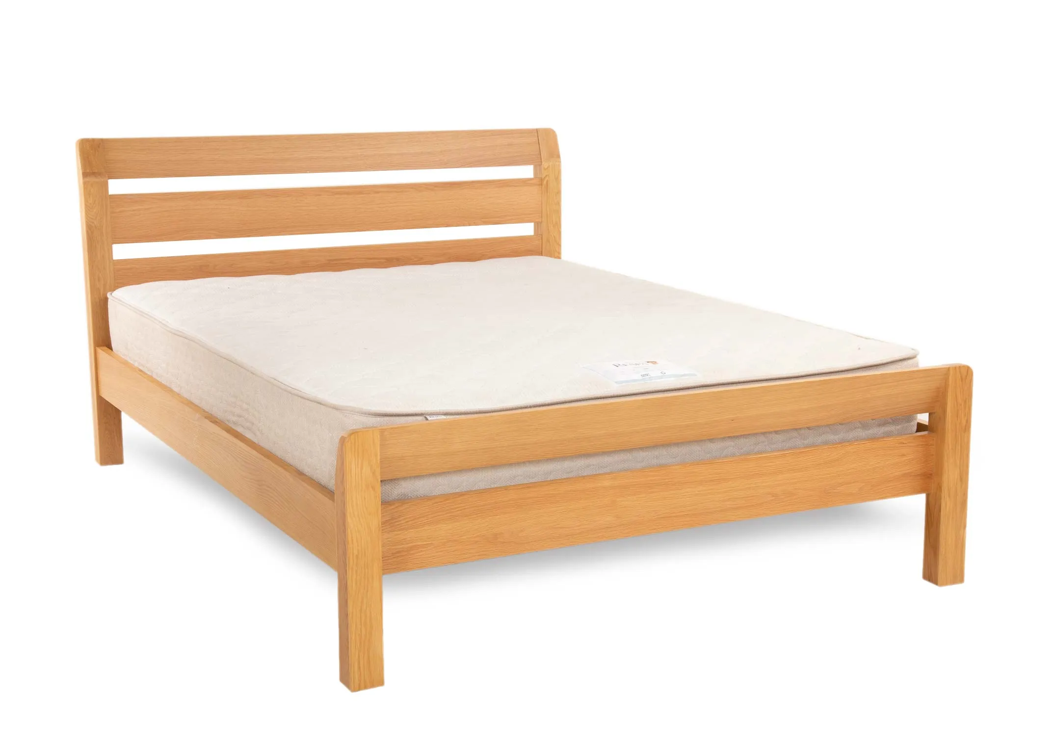 A double 4ft6 oak bed frame from EZ Livings Iris range. Angled view of ladder headboard and footend.