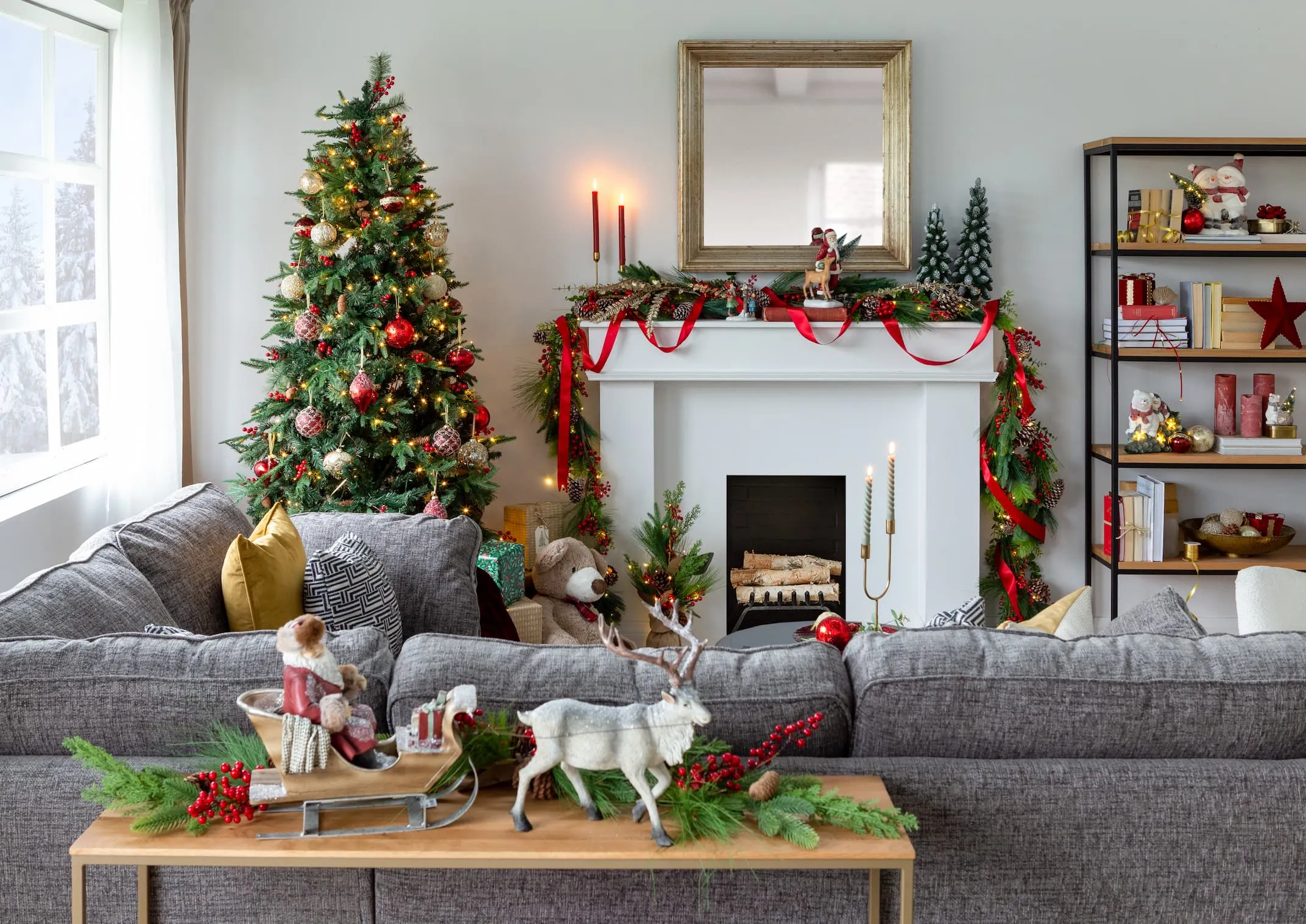 A lifestyle image of a red traditional christams set up with vermont tree