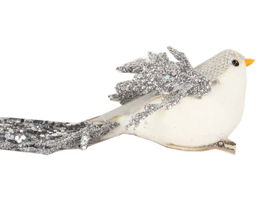 A silver & white glitter bird with long tail from EZ Livings Christmas range. Closeup