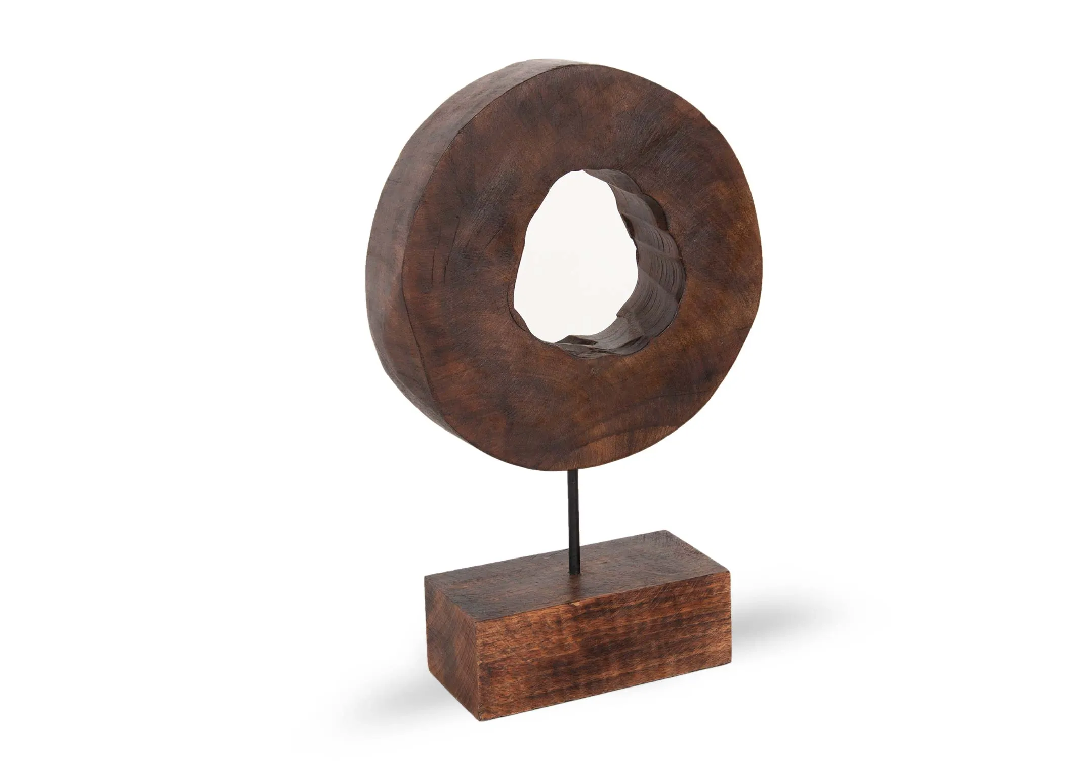 A dark wood ornament base with carved circular feature from EZ Living's Xerra range. Angled view of uneven doughnut shape