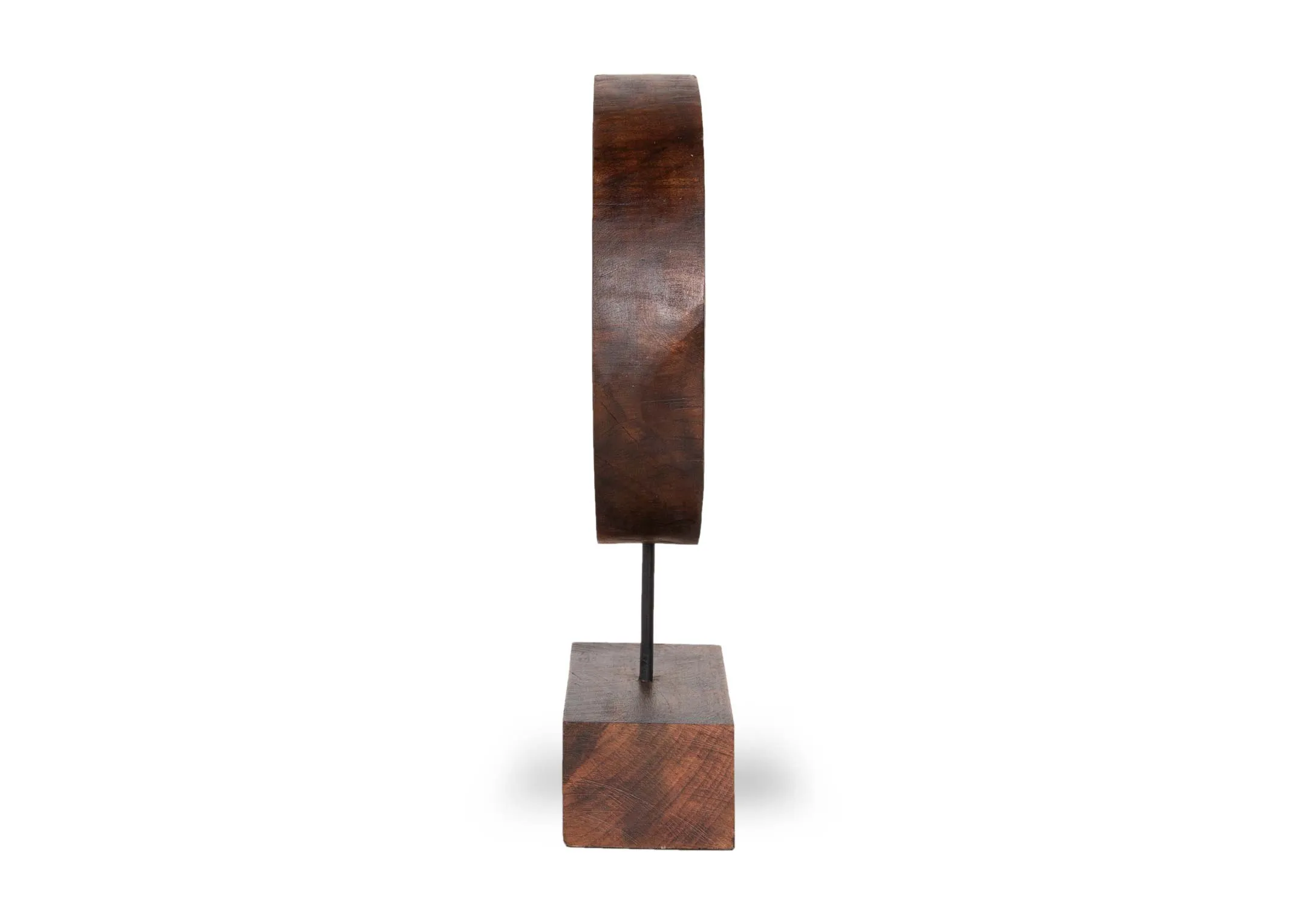 A dark wood ornament base with carved circular feature from EZ Living's Xerra range. Front view of doughnut hold centre.