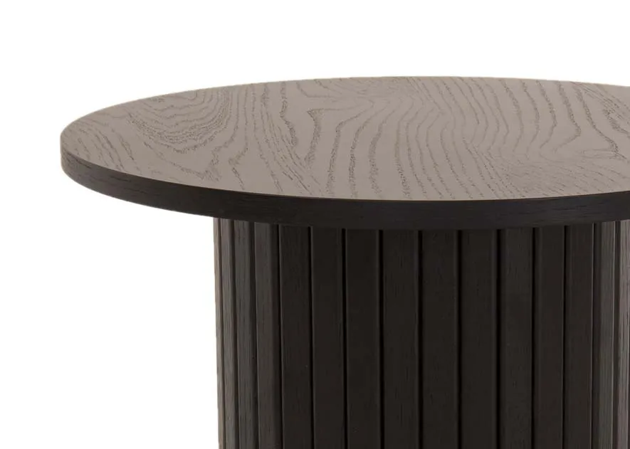 A round black oak lamp table with a slatted base from EZ Livings Nola range. Closeup of textured top