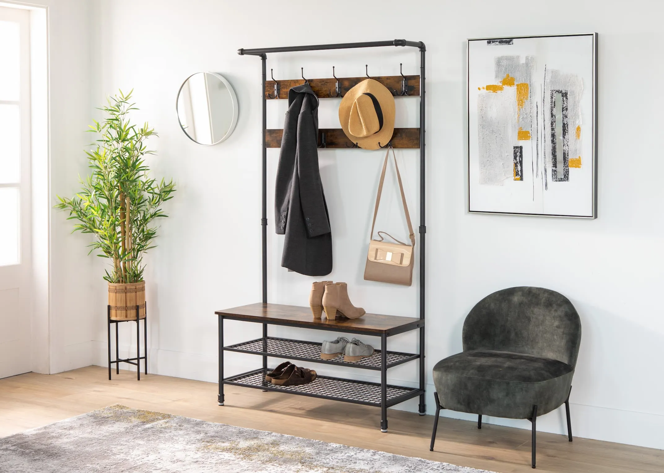 A coat stand with 10 hooks and 3 shelves from EZ Livings Yaga range. Angled view of black metal frame