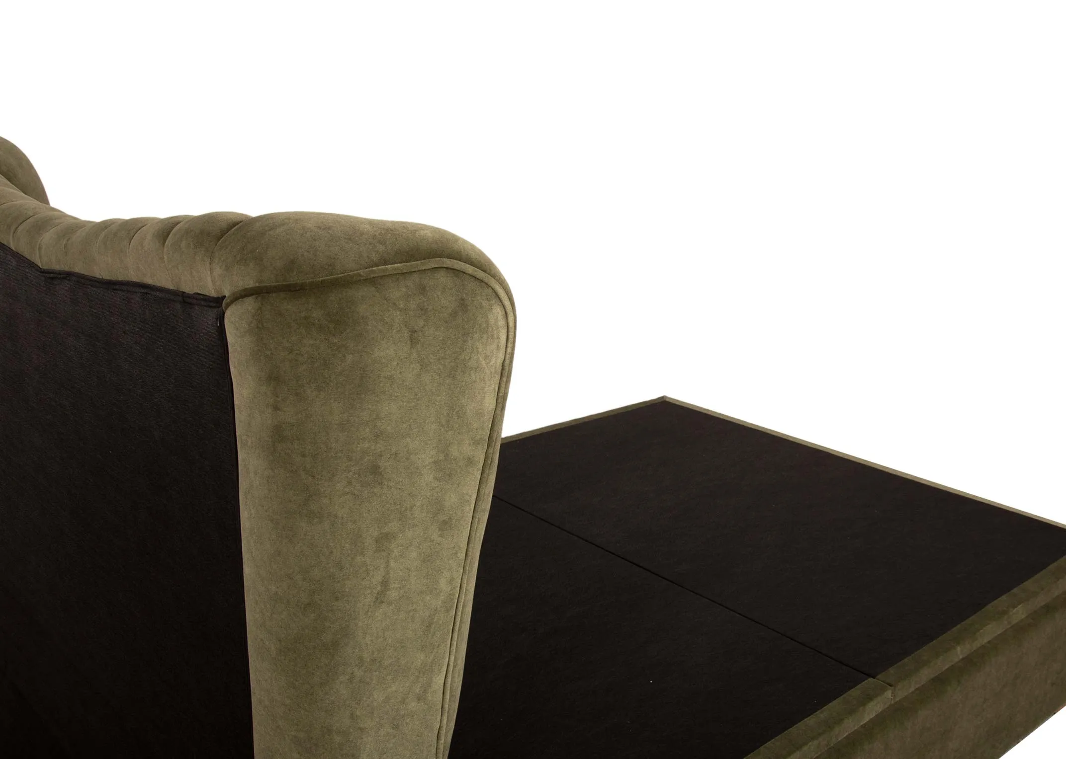 A 5ft king size green velvet ottoman bed from EZ Livings Robin range. Side view of light oak feet with mattress