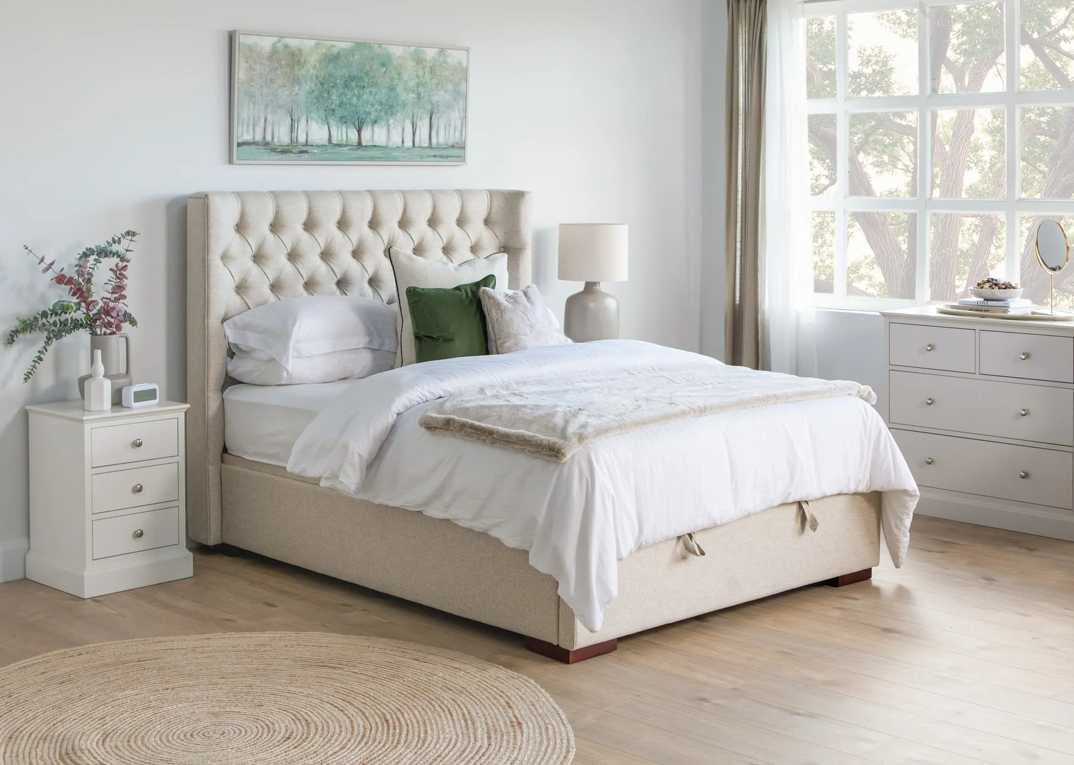 A 5ft king size beige linen fabric ottoman from EZ Livings Chester range. Closeup of beige linen fabric