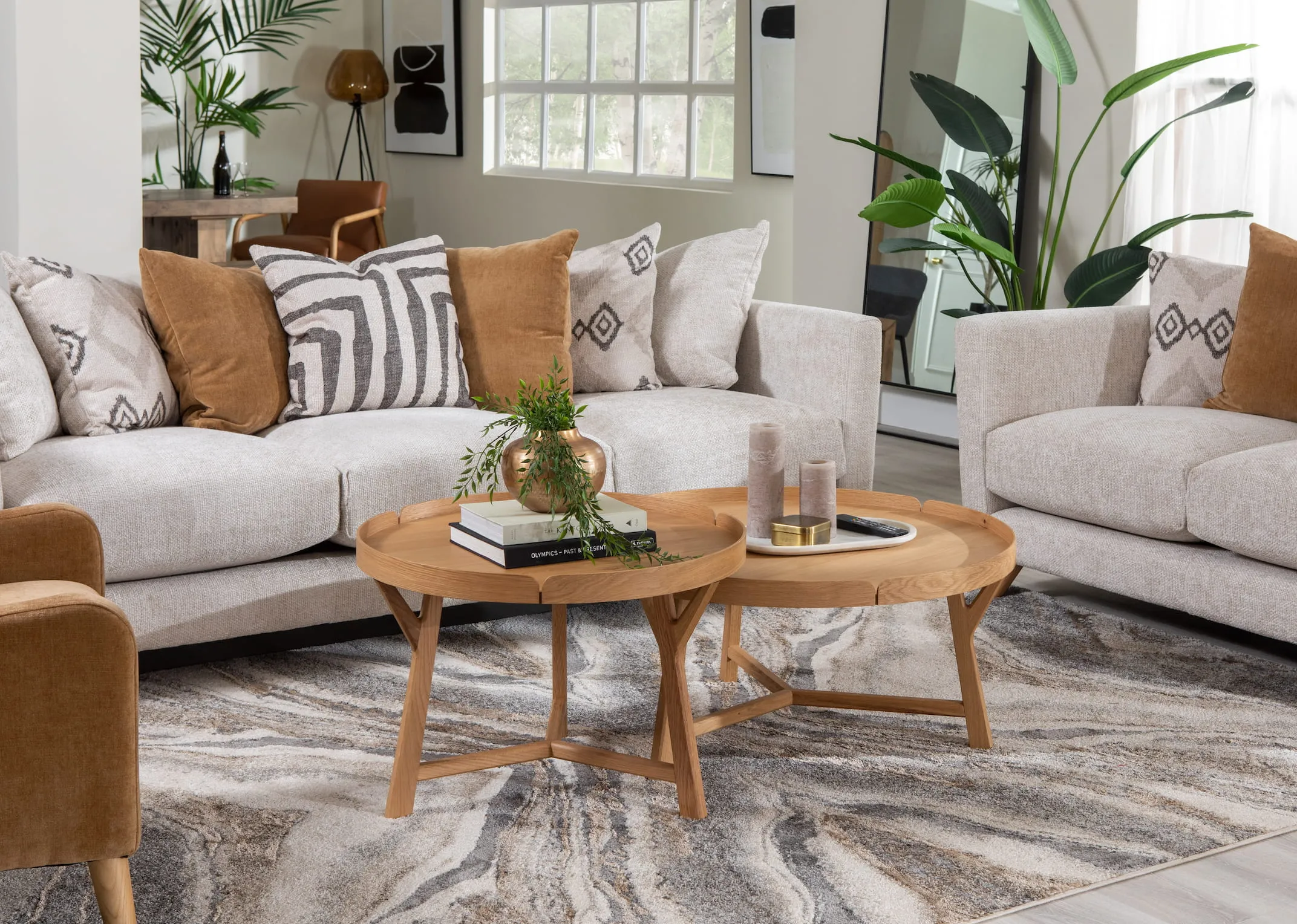 A lifestyle image of the Ponti Corner sofa with trieste table set dressed with candles