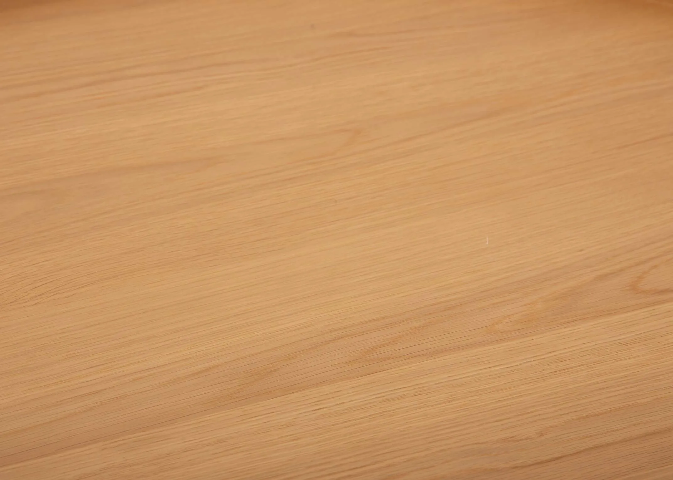 A round solid oak coffee tray table with tripod stand from EZ Livings Trieste range. Closeup of tray style table top