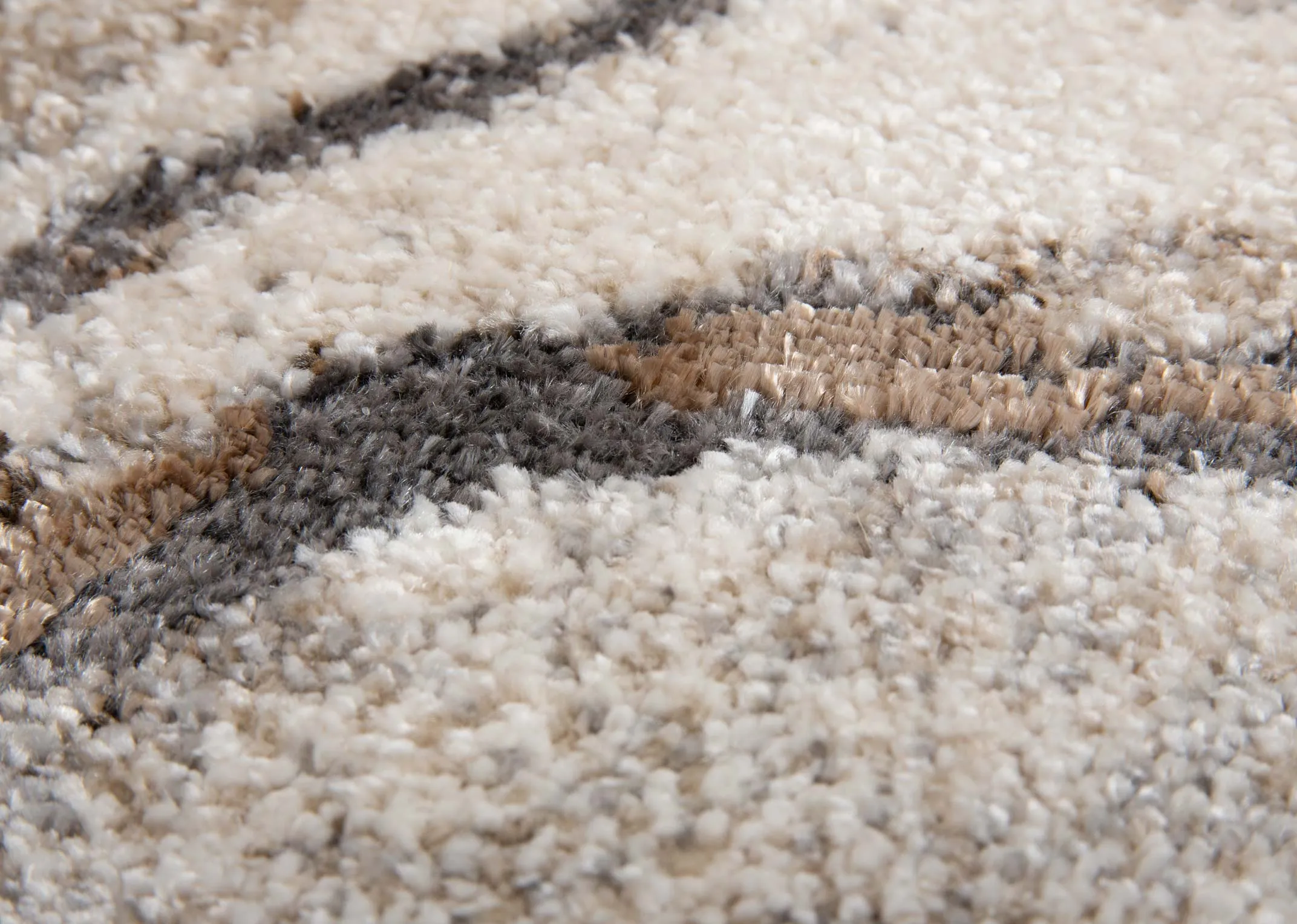  cream brown and grey print rug from EZ Livings Avanti range. Closeup of texture