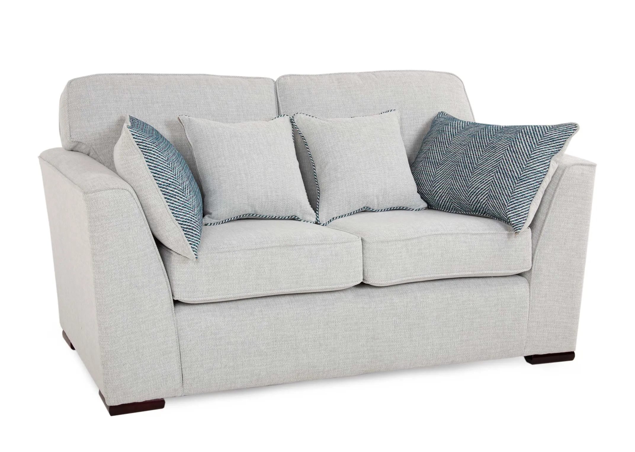 A light grey fabric 3 seater sofa from EZ Livings Santorini range. Angled view of sofa with 2 scatters & 2 boslters.