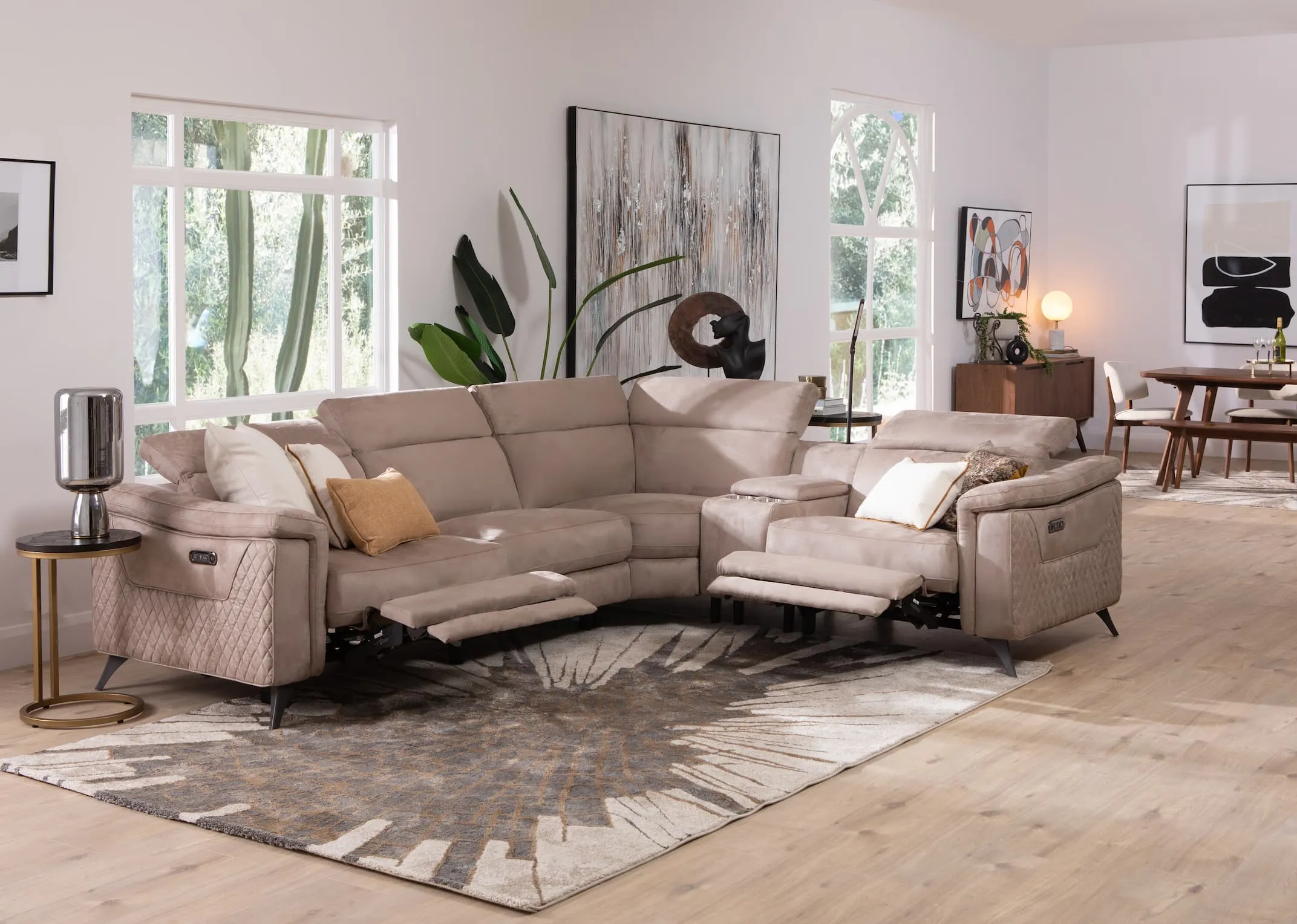 A lifestyle image of the Bellissimo Corner sofa relcined with chevron side table