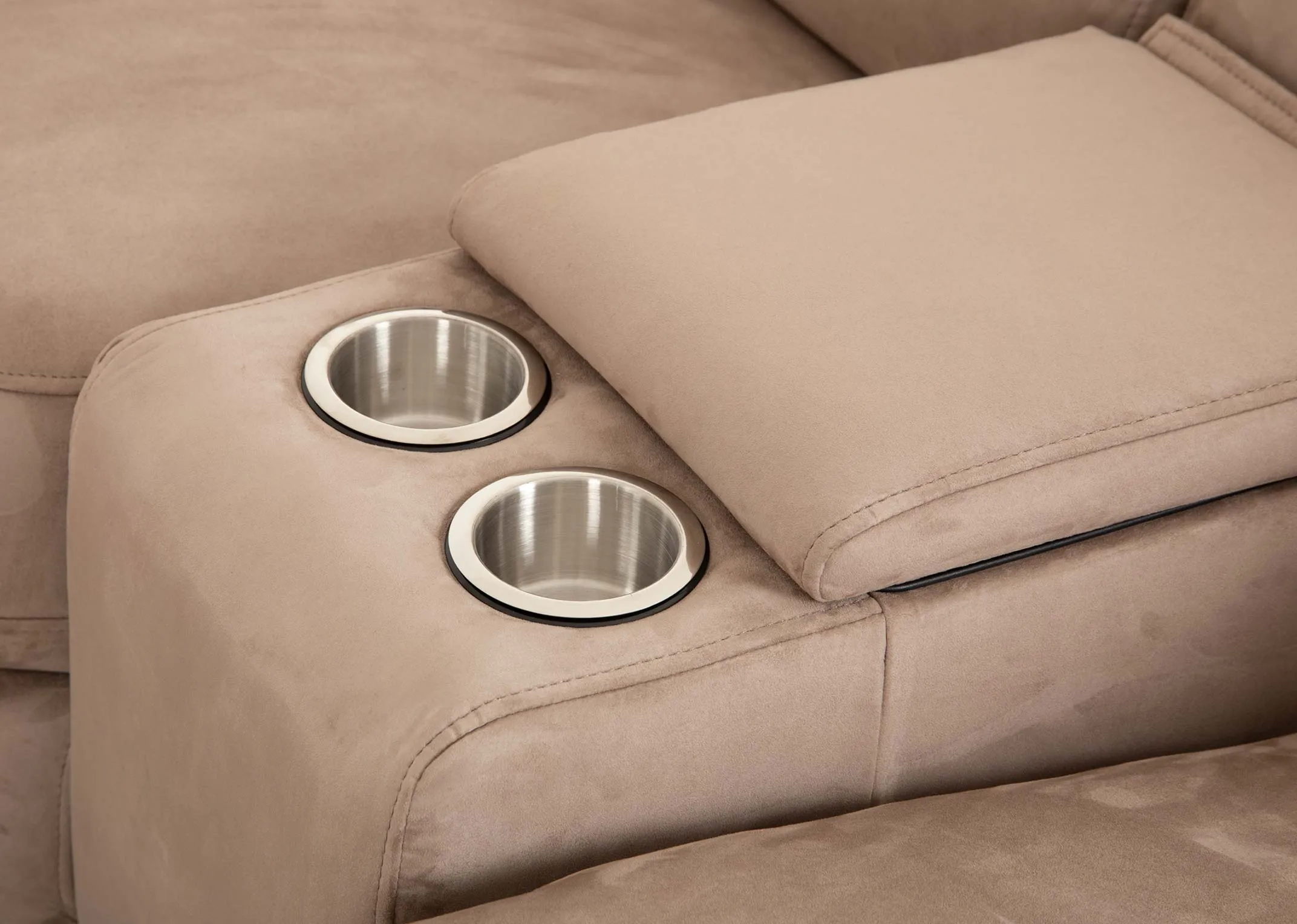 A grey fabric power reclining corner sofa from EZ Livings Bellissino range. Angled view of head tilts on end recliners