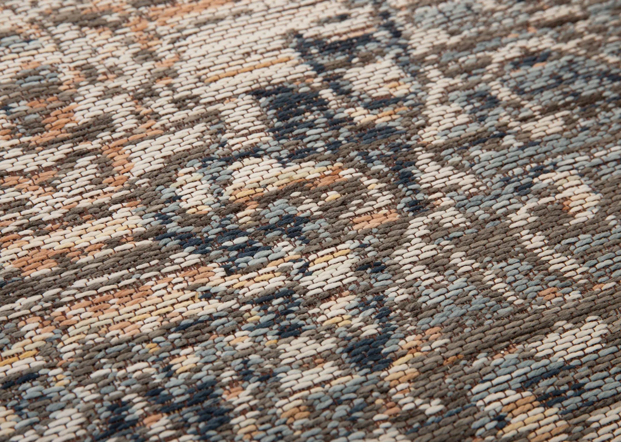 A rust grey & silver print rug from EZ Livings Maxima range. Closeup of texture 7 print