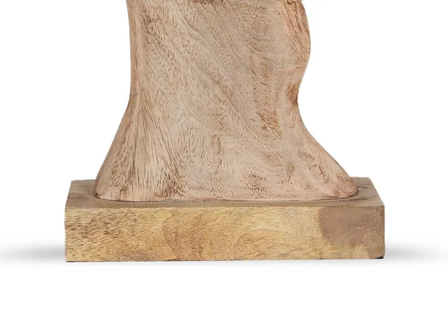 A wood face ornament with a carved out space from EZ Livings Masimo range.