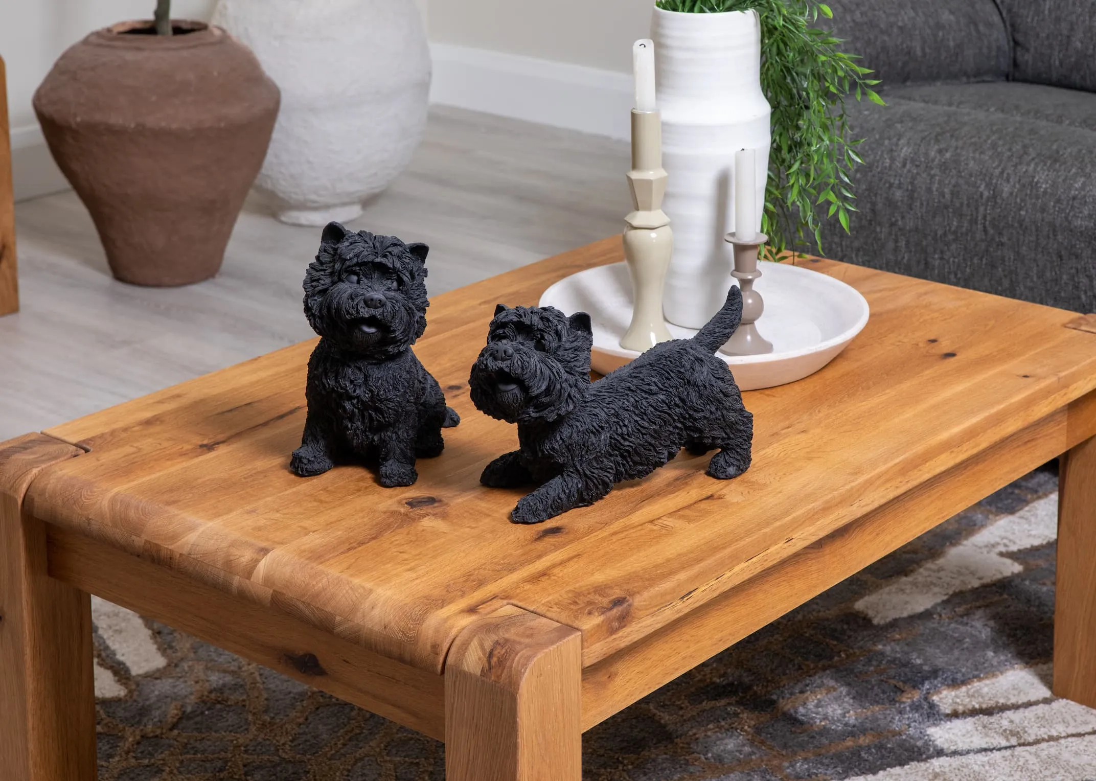 A lifestyle image of the Como coffee table with terrier ornaments with marble tray