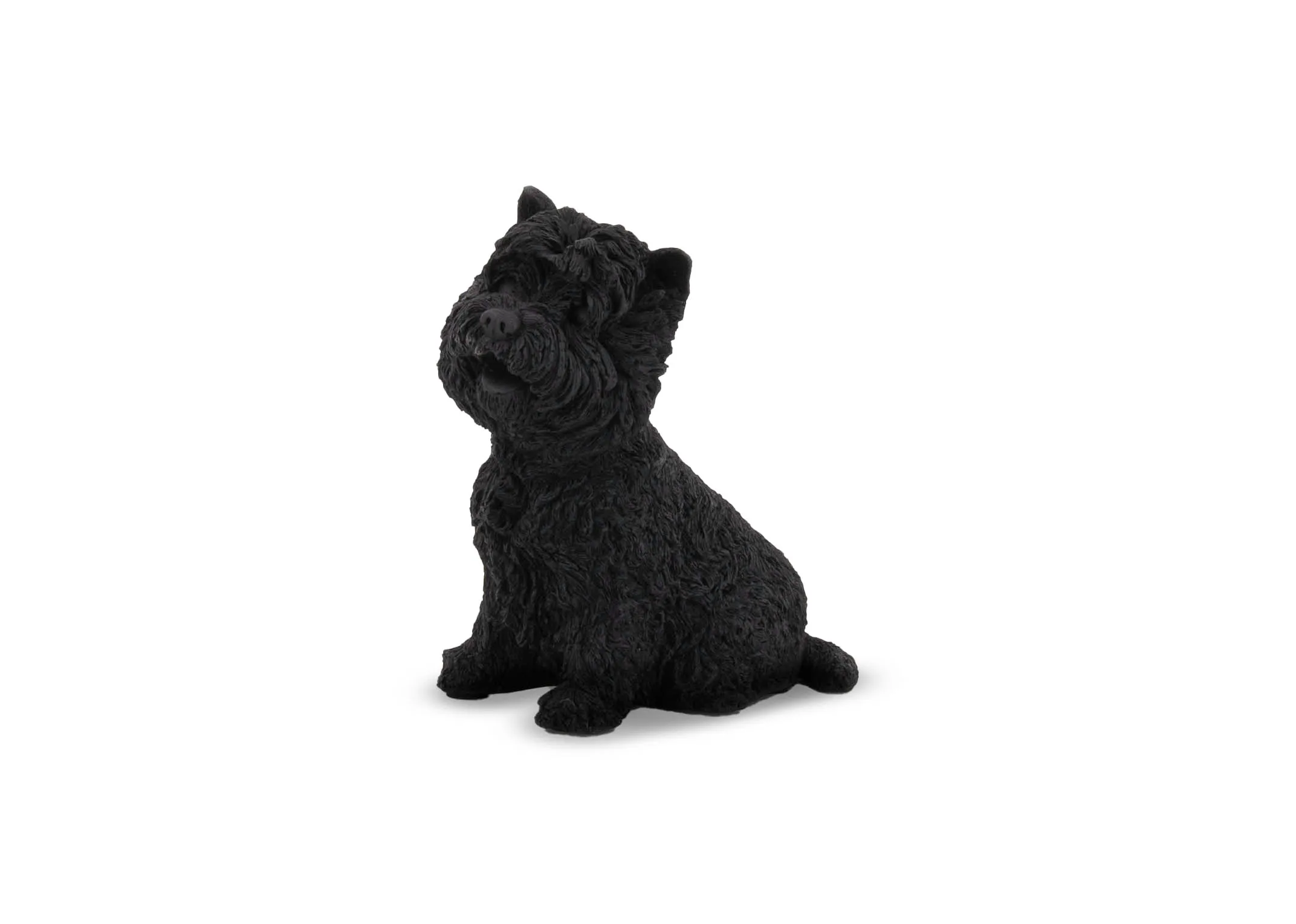A black ornament of a cheeky sitting terrier dog from EZ Living Furnitures Ornament range.