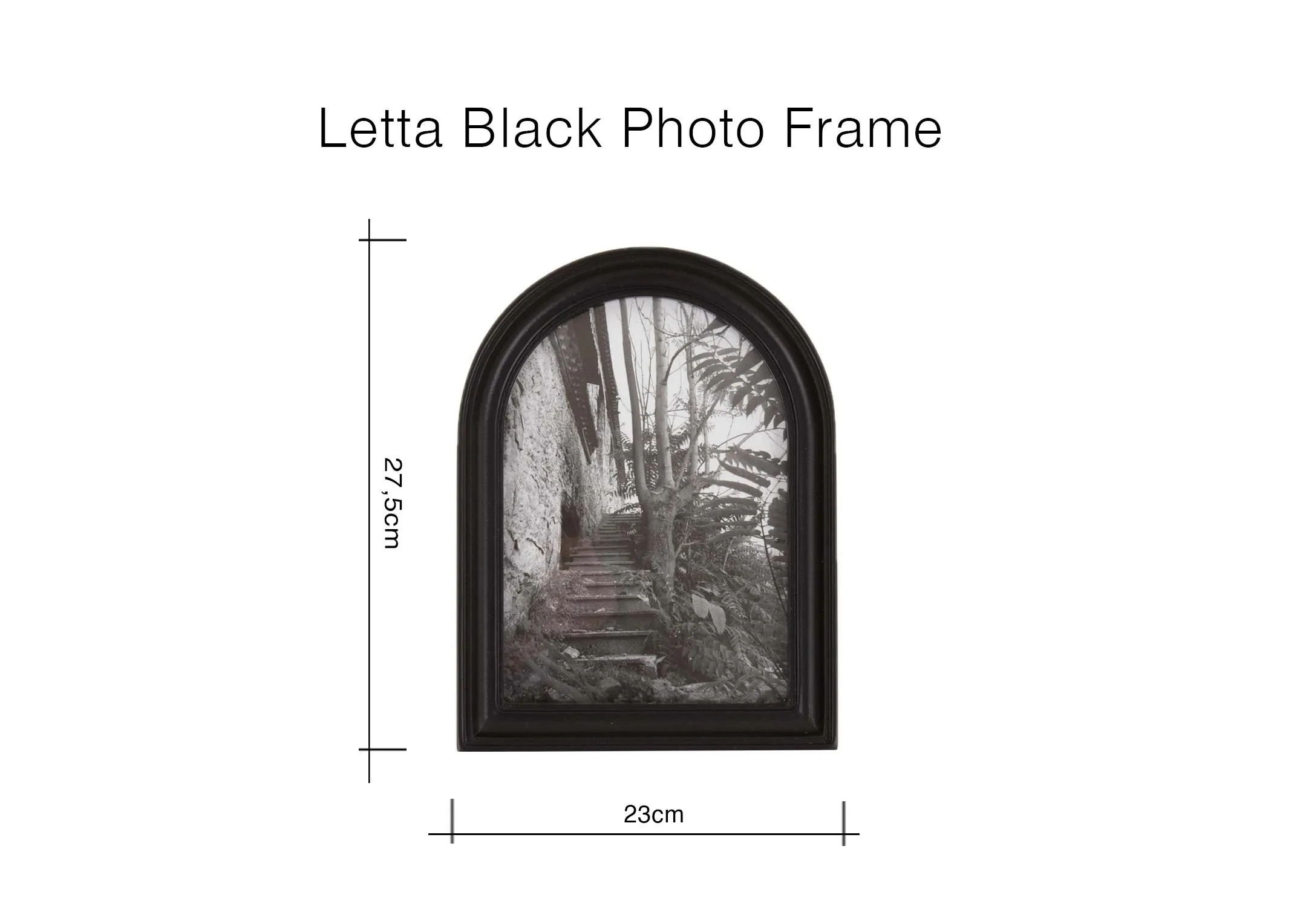 A lifestyle image of the Letta Frames on a mantle with 2 books.