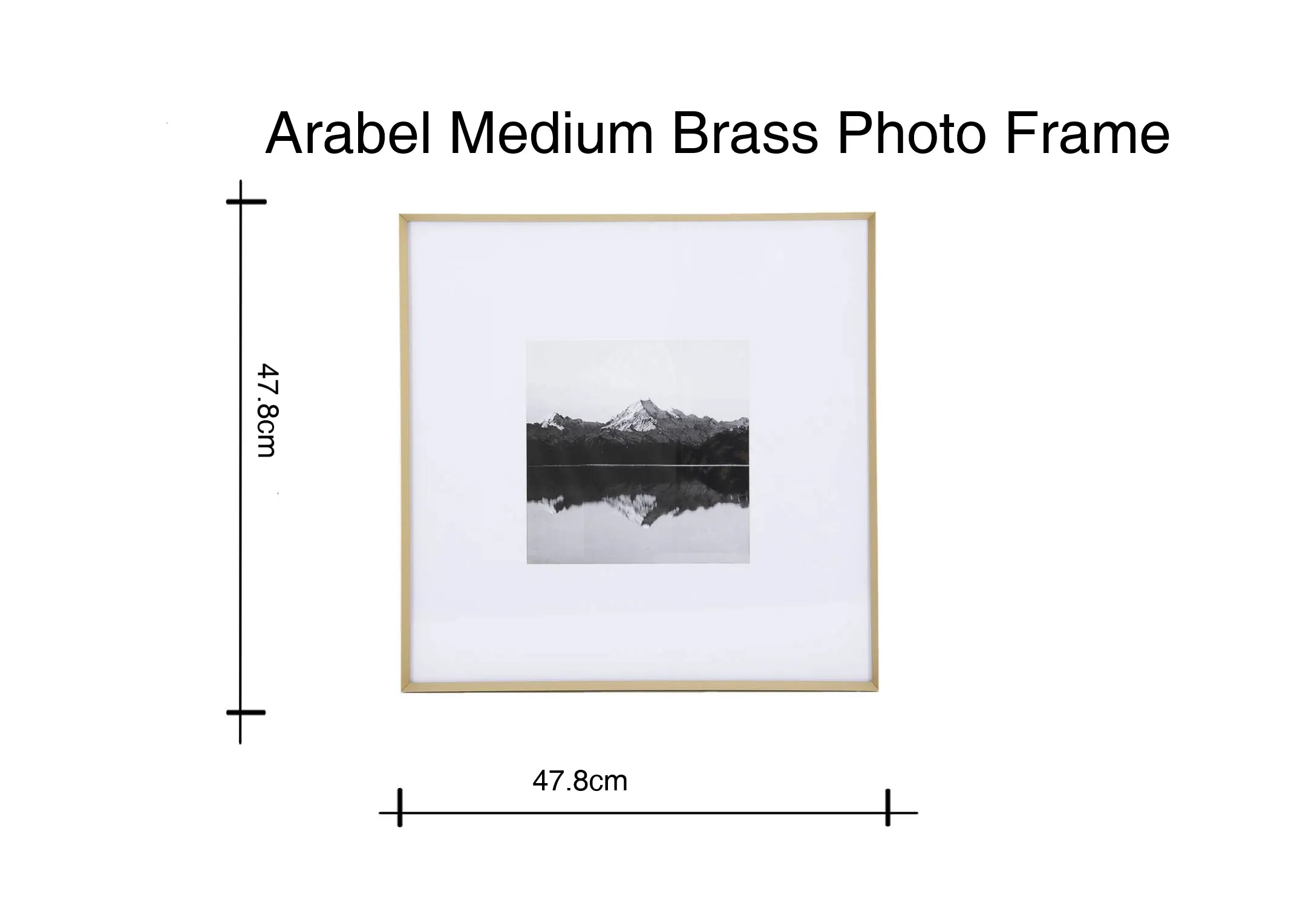 A lifestyle image of the Arabel Medium photo frame with the Nola black tv unit and Daisy table lamp.