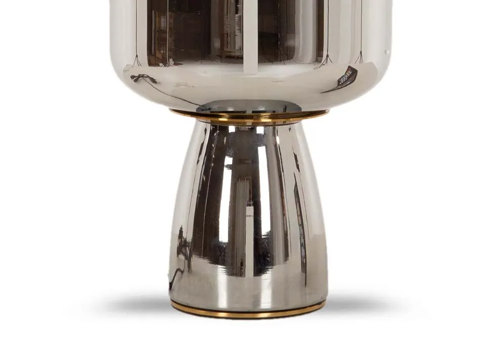 A silver grey glass table lamp with gold trim from EZ Livings Lotta range. Closeup of table lamp base
