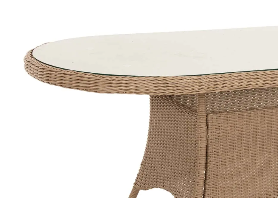 A rattan oval garden table with glass table top from EZ Livings Seville range.
