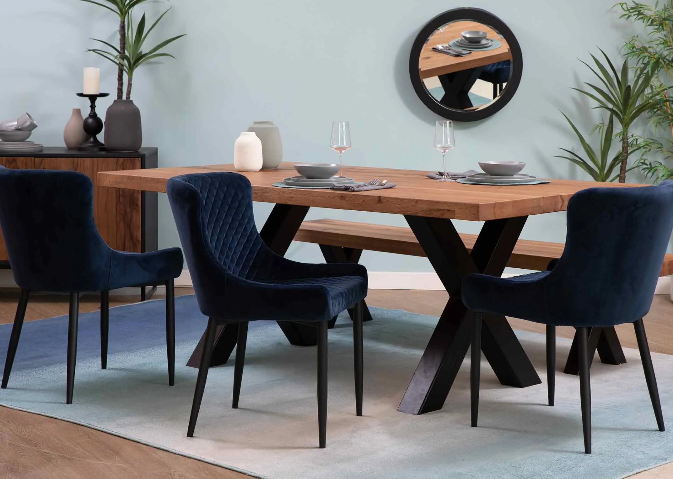 A dining chair in blue velvet from the Ottowa range available at EZ Living Furniture.