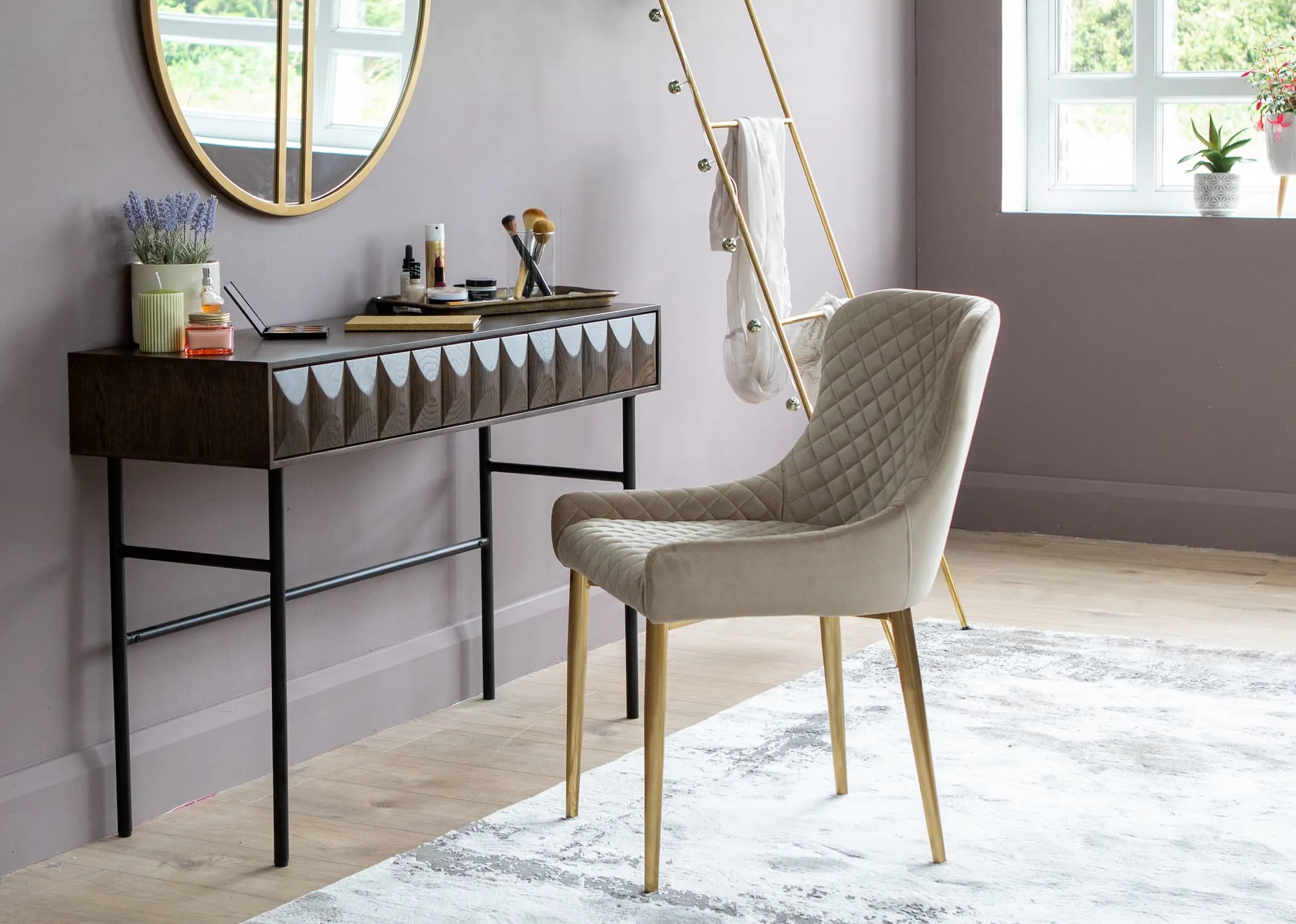A lifestyle image of the Latina Console paired with the Ottowa Dining Chair & Chevron mirror as a makeup chair