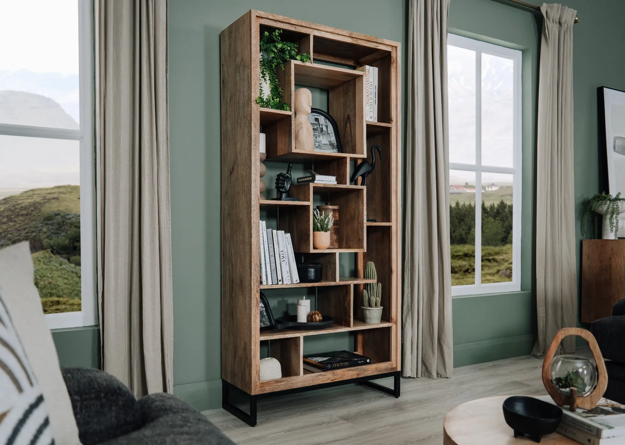 A lifestyle image of the Mango Display Unit with a selection of accessories and plants on the shelves.