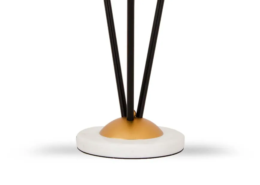 A metal table lamp with 3 round bulbs from EZ Livings Ortez range. Closeup of black cable with inline switch