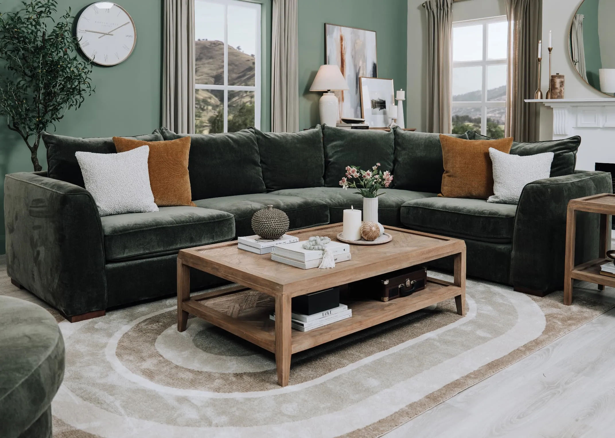 A lifetsyle image of the Lucius LAF Corner sofa with Julian coffee table and Delilah rug.