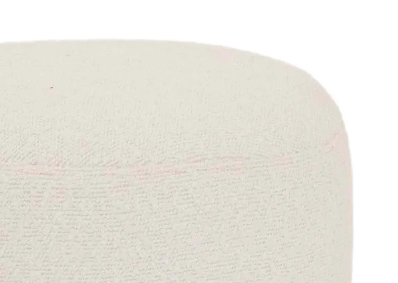 A cream boucle footstool from EZ Livings Parker range.Closeup of boucle fabric