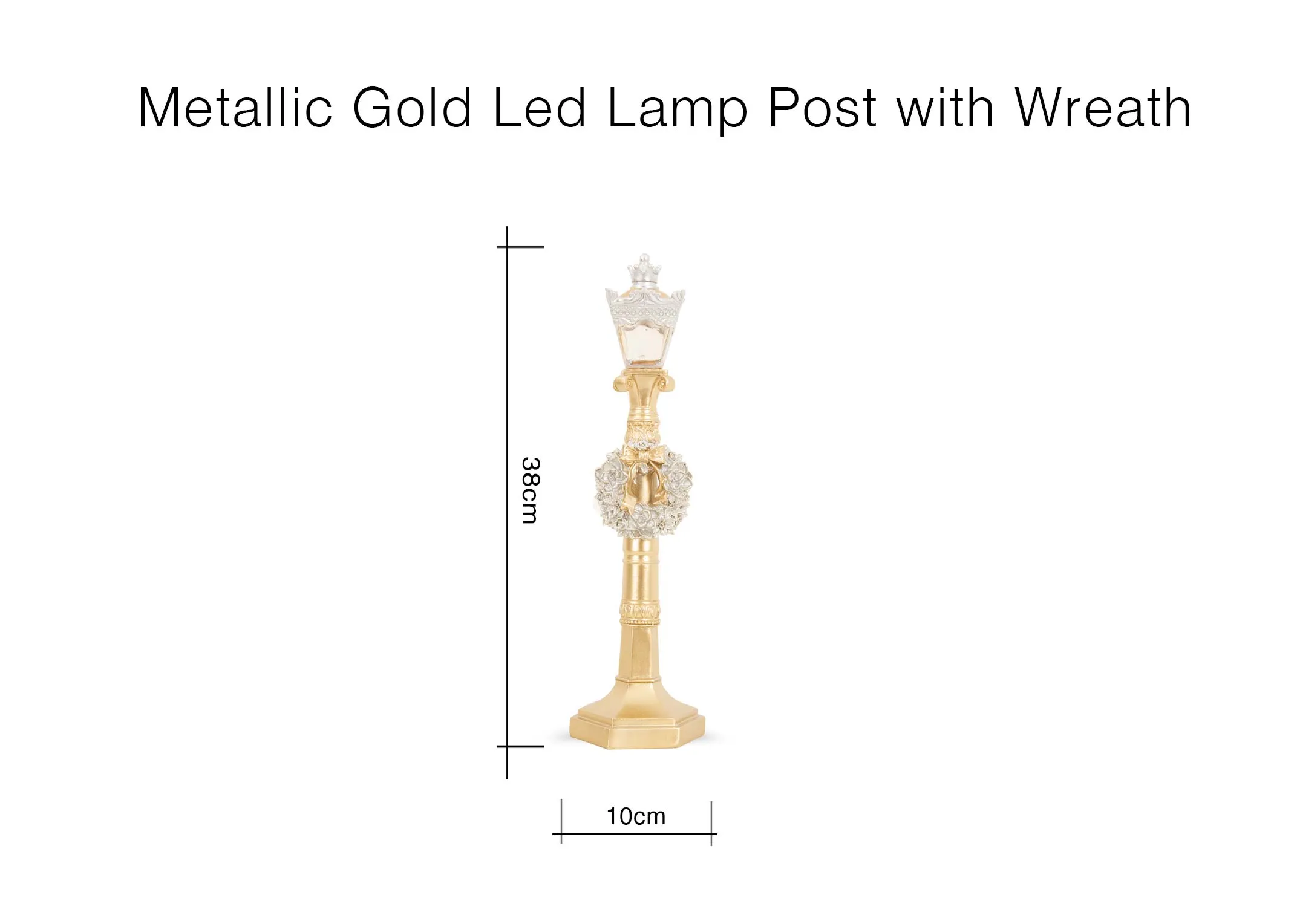 A lifestyle image of a tray on a coffee table with Polar bear with sled and a selection of gold trees & LED lamppost