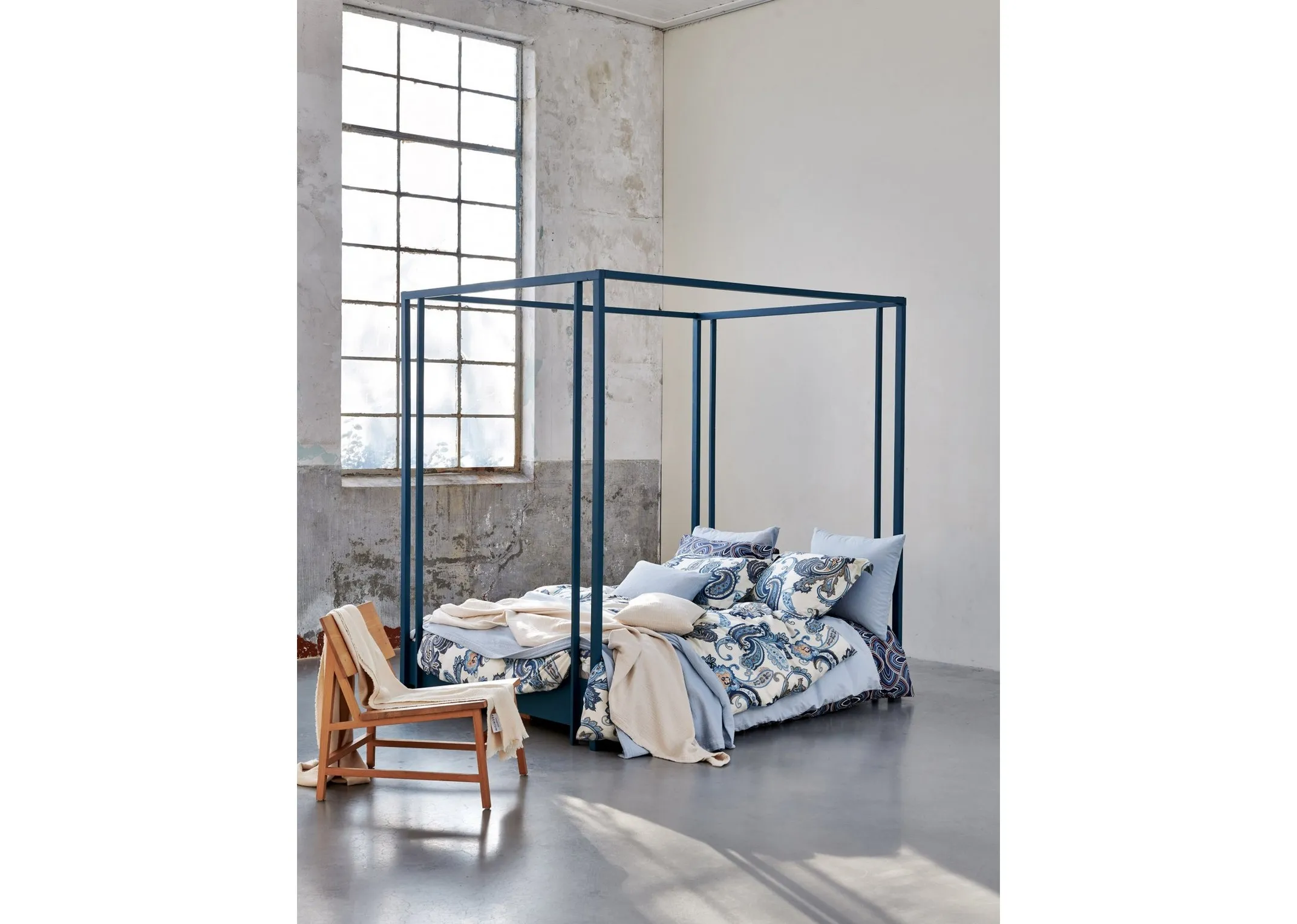 A lifestyle image of the Vandyck bedlinen including the Powder blue bedspread.