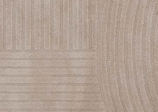 A beige & cream geometric design rug from EZ Livings Elio range. Closeup of textured design