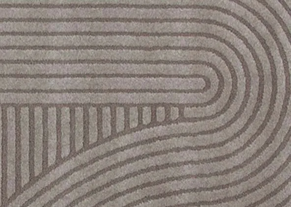 A grey geometric design rug from EZ Livings Eli range. Closeup of beige and grey design