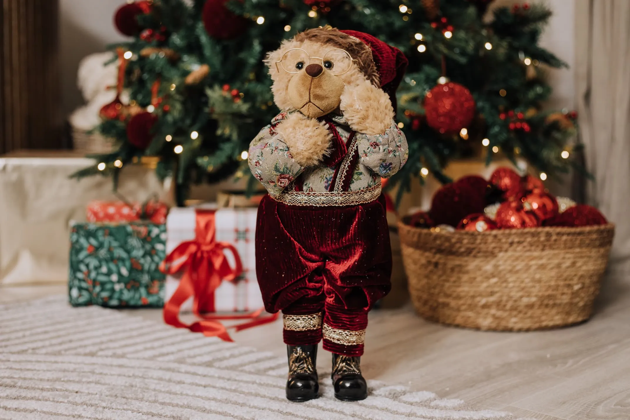 A lifetsyle image of the Boy Bear under a Christmas tree.