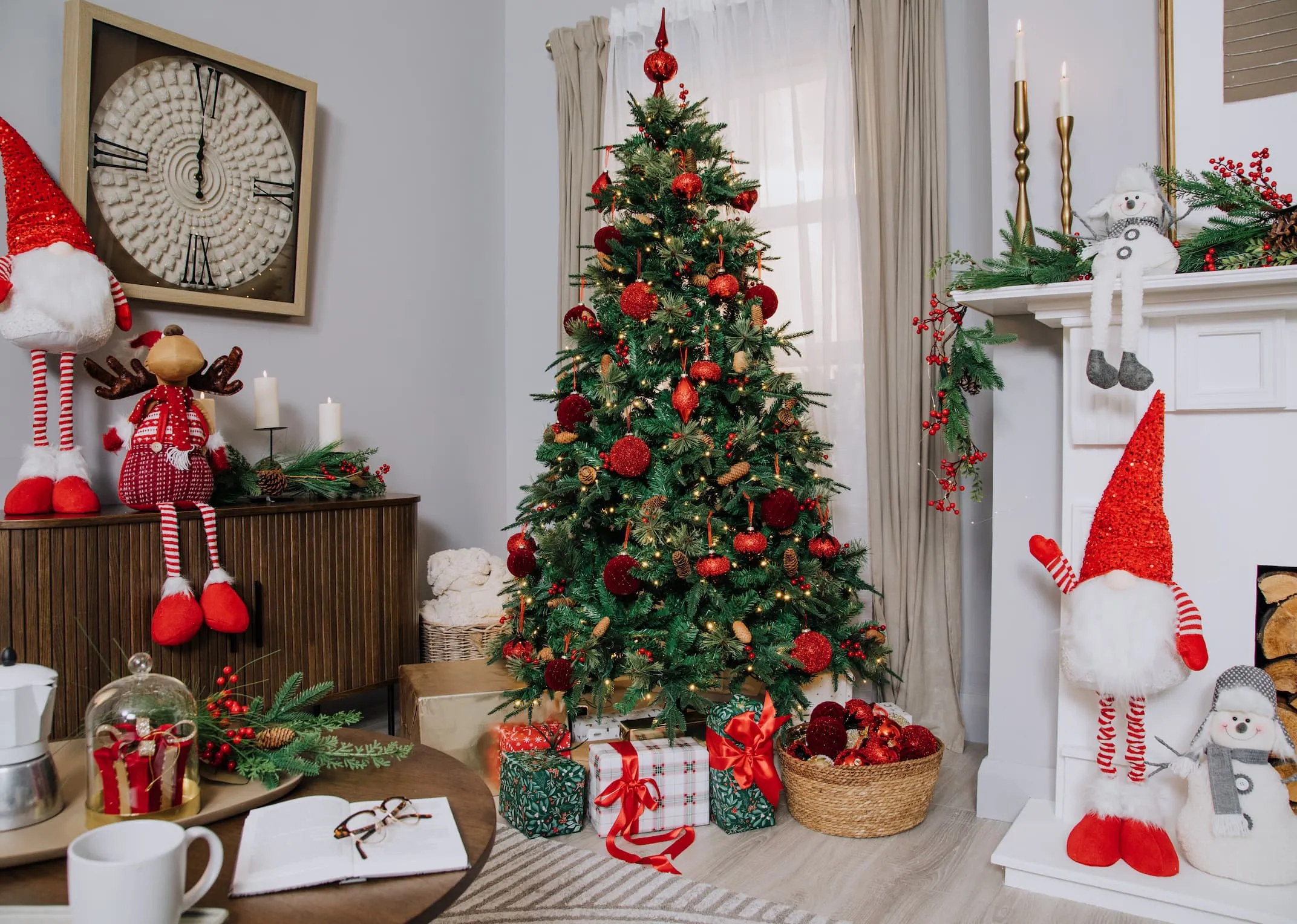 A lifestyle image of the Vermont Berry Tree with snowman sitting on the mantle and one on the fireplace with a Gnome