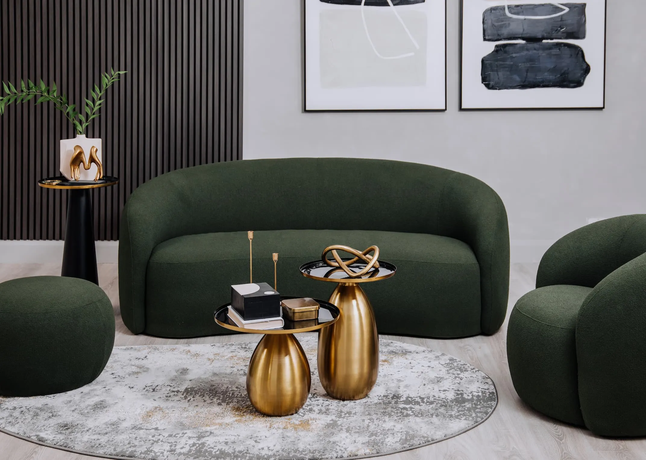 A lifestyle image of the Florance green sofa with Emerson tables.