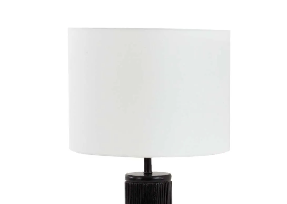 A black pannelled table lamp with white barrel shade from EZ Livings Lohas range. Closeup of white barrel shade