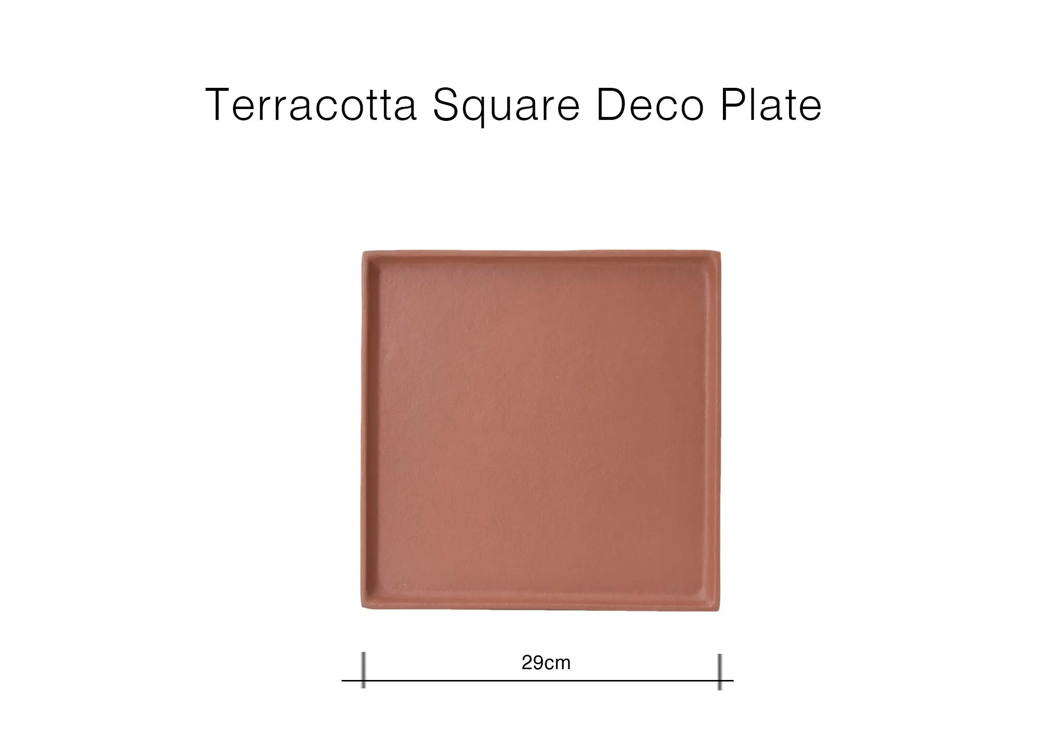 A lifestyle image of the Kingston dining table with terracotta tray with Grey Deluxe LED Candles and 2