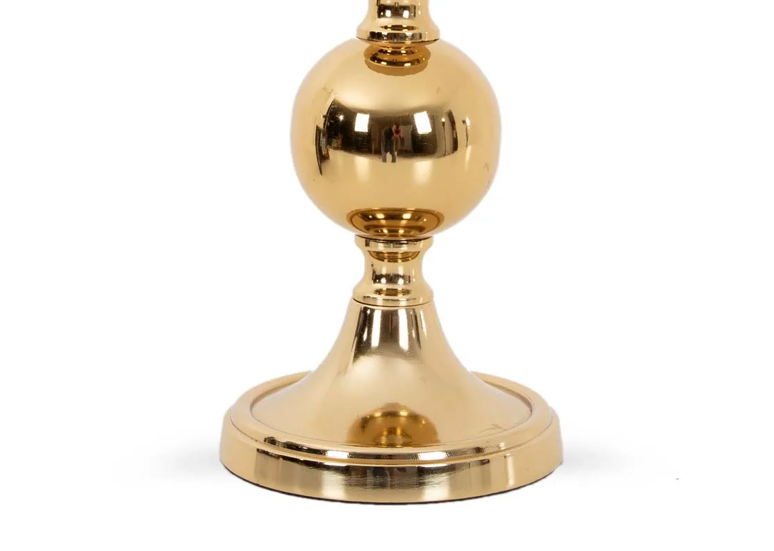 A medium gold pillar candle holder from EZ Livings Candle Range.Closeup of mirror base