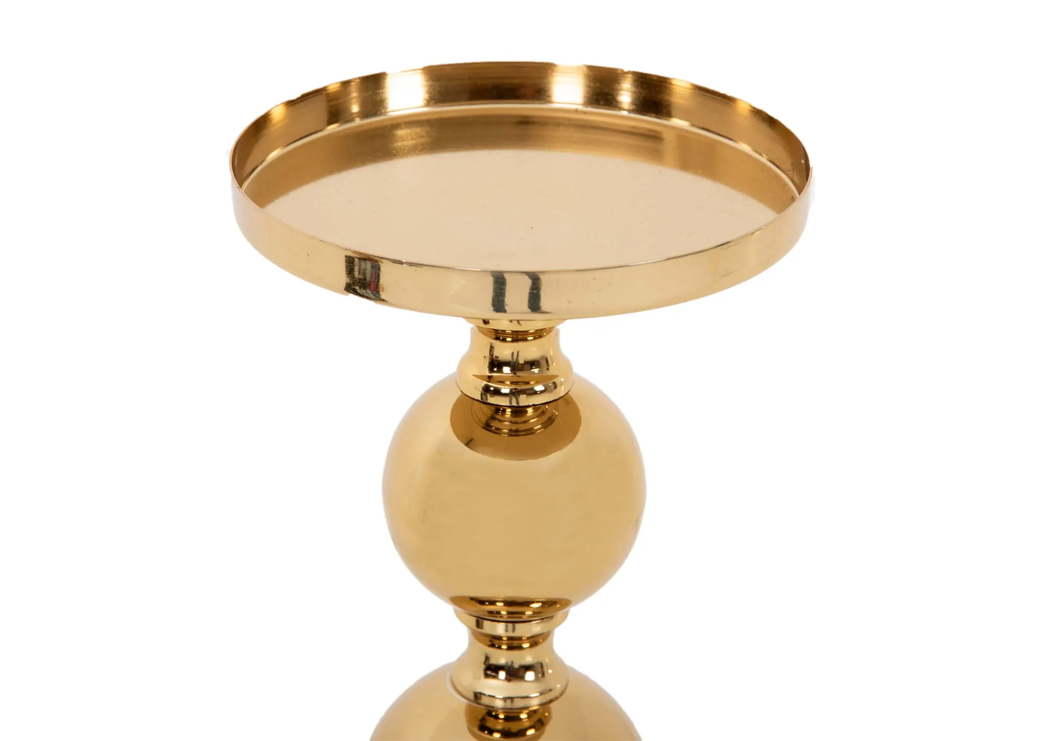 A lifestyle image of the Hampton Console table with Gold Pillar Candle holders with kavandu vase.