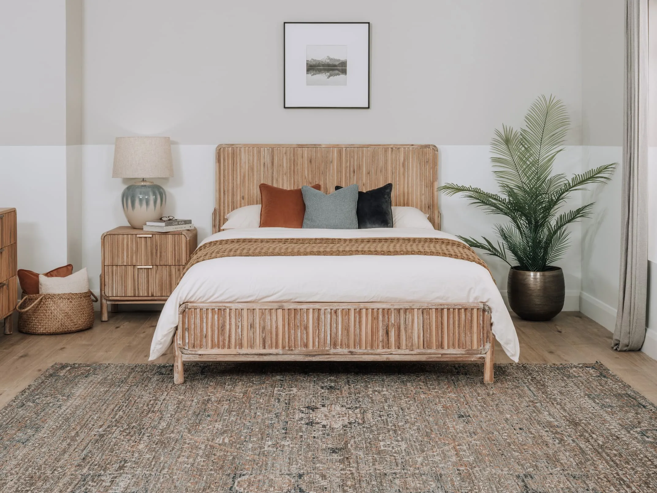 A lifestyle image of the Milo 4ft6 bed with locker and maxima rug.